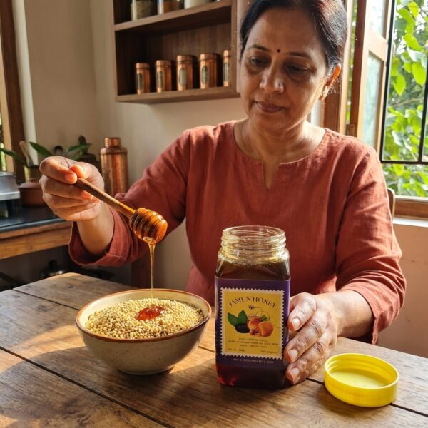 Sisira Organics Jamun Honey - Raw Indian Blackberry Honey jar with Jamun blossoms